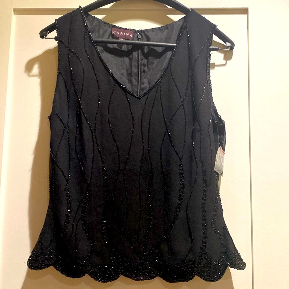 Marina  size M ladies beaded top. Like new